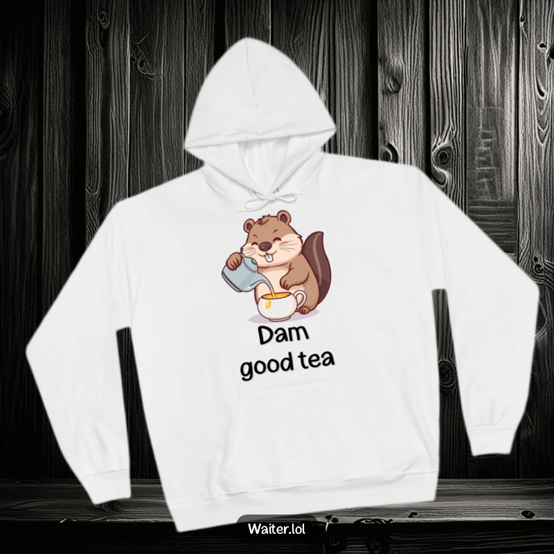 Funny beaver tea hoodie, a determined beaver carefully pouring tea, offering warmth and a touch of meticulous humor.
