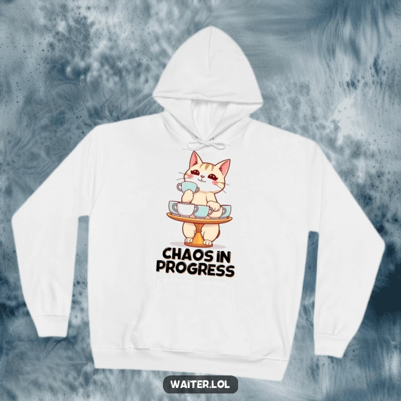 Funny cat hoodie featuring a determined cat balancing a tray of teacups, perfect for cozy and humorous wear.