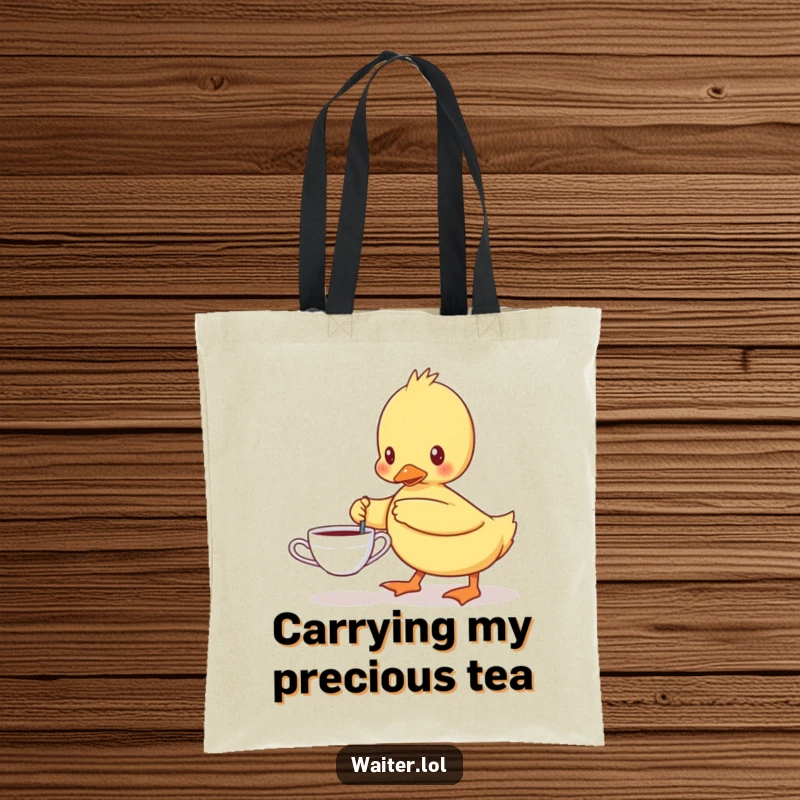 Funny tote bag depicting a determined duckling carefully carrying a single teacup, perfect for carrying tea or daily essentials humorously.